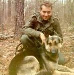 Anthony Jerone with bomb sniffing dog in Vietnam